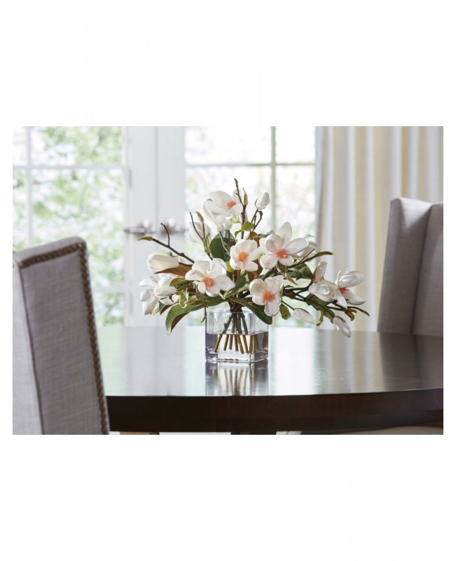 Medium-sized magnolia flower in a glass cube