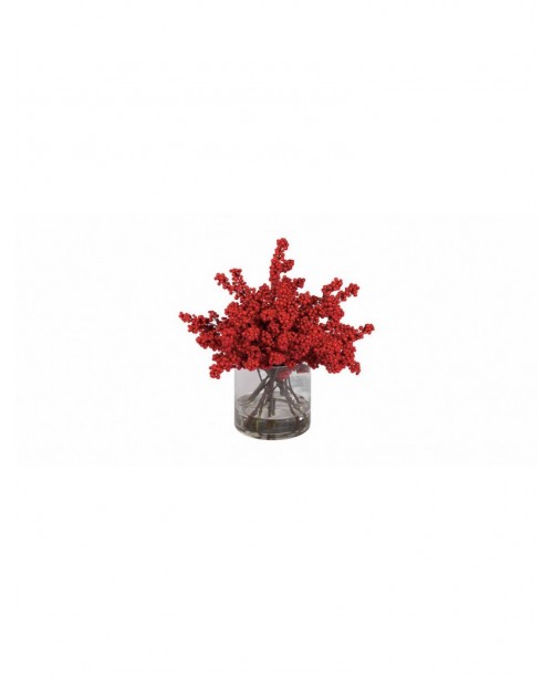 Red holly berries in glass jar