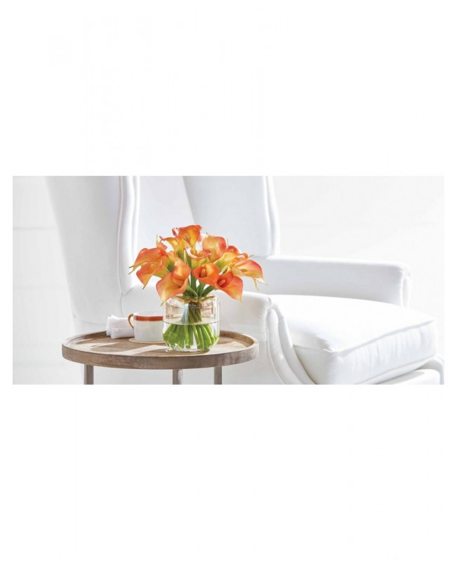 Calla lilies in glass vase, orange